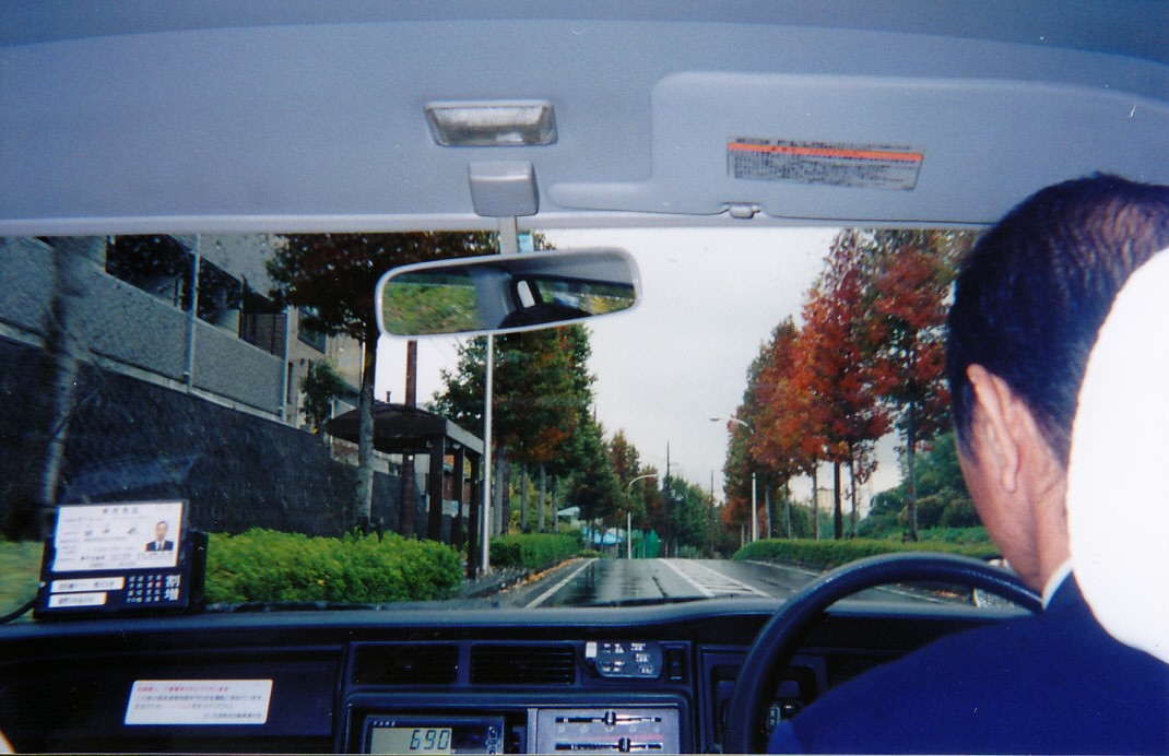 �^�N�V�[����̌i��